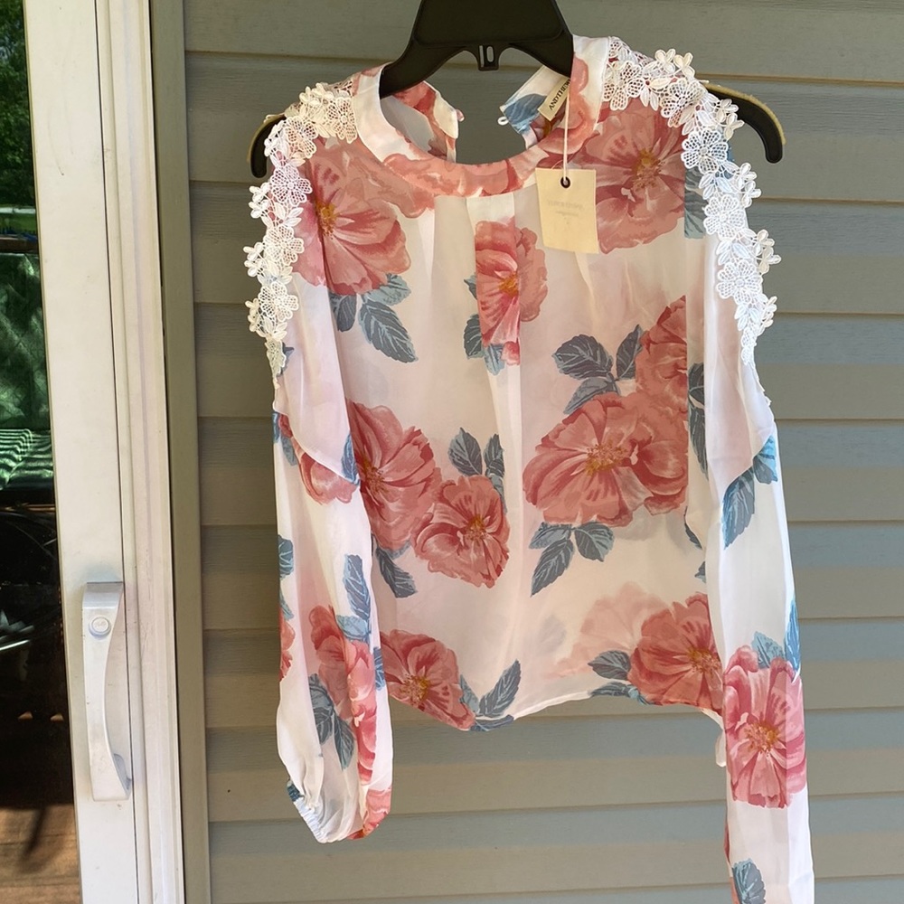Andthewhy flowered cold shoulder top. NWT